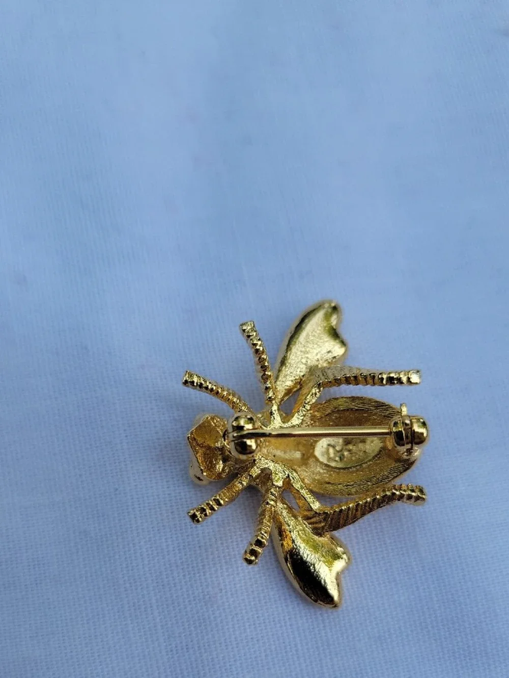 Vintage Joan Rivers Gold Bee Brooch with Black Accents Green Eyes